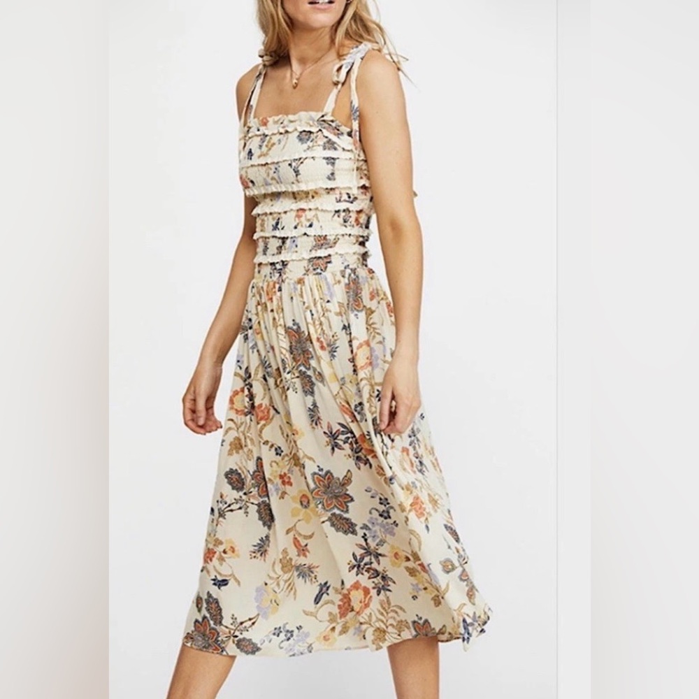 Free People Isla Midi Dress with a floral print and smocked bodice size small